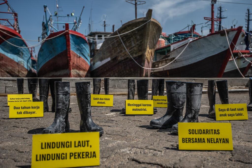 Greenpeace Indonesia holds a photo-op “Boots to boost justice” using fishers' boots in Muara Baru fishery port, North Jakarta. This action is part of solidarity to a group of Indonesian fishers that has filed a suit in the US under the Trafficking Victims Protection Reauthorization Act (TVPRA) alleging that they experienced forced labor as they caught tuna that was bought and sold in the US market. This historic suit is the first TVPRA case of its kind. From now onwards, this will be called FISHERS MOVEMENT.